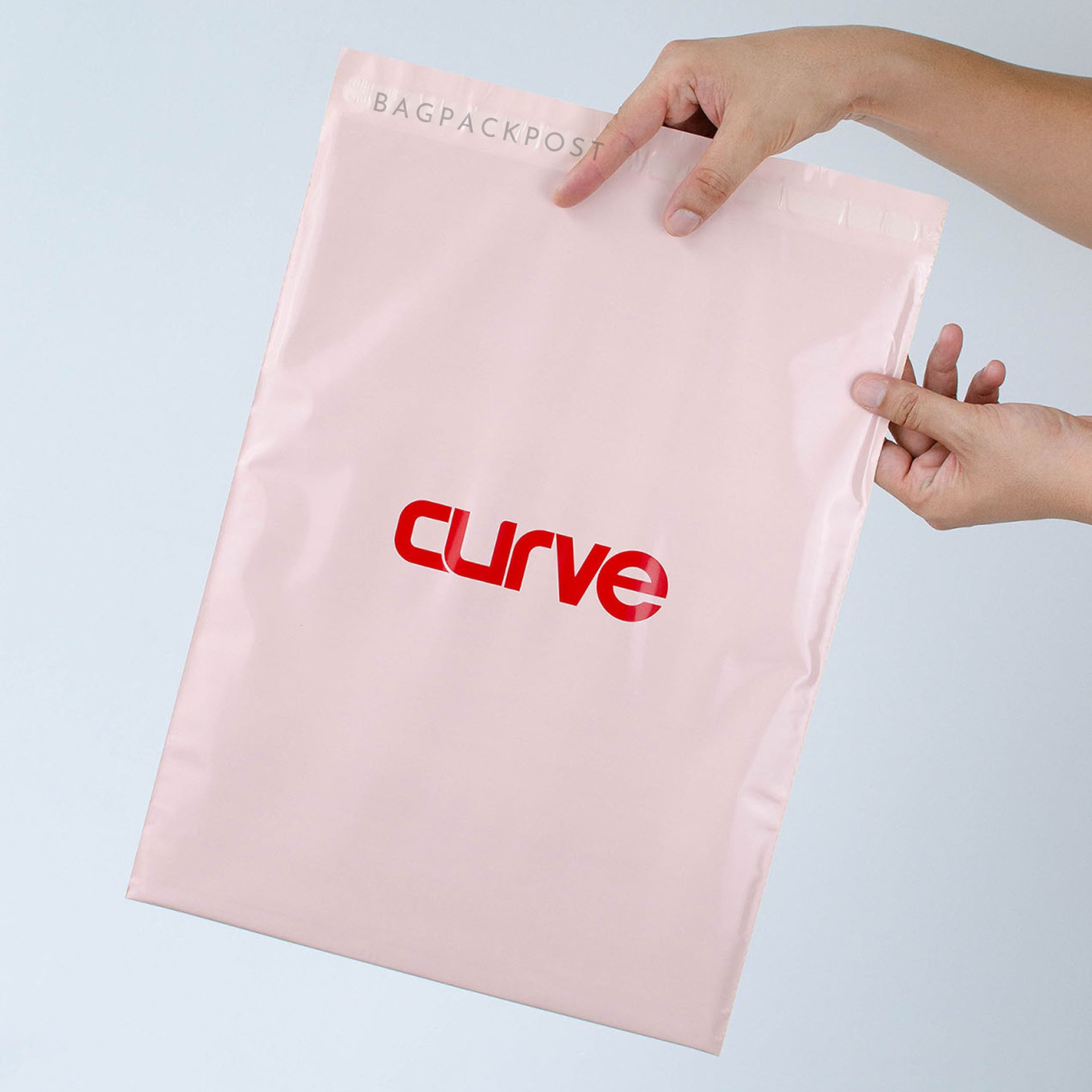 ผลิตถุงไปรษณีย์ ซองไปรษณีย์พิมพ์ลาย ถุงพัสดุ ถุงไปรษณีย์พิมพ์ลาย  ซองพิมพ์ลาย สีชมพู CURVE ส่งด่วน งานคุณภาพ | BagPackPost